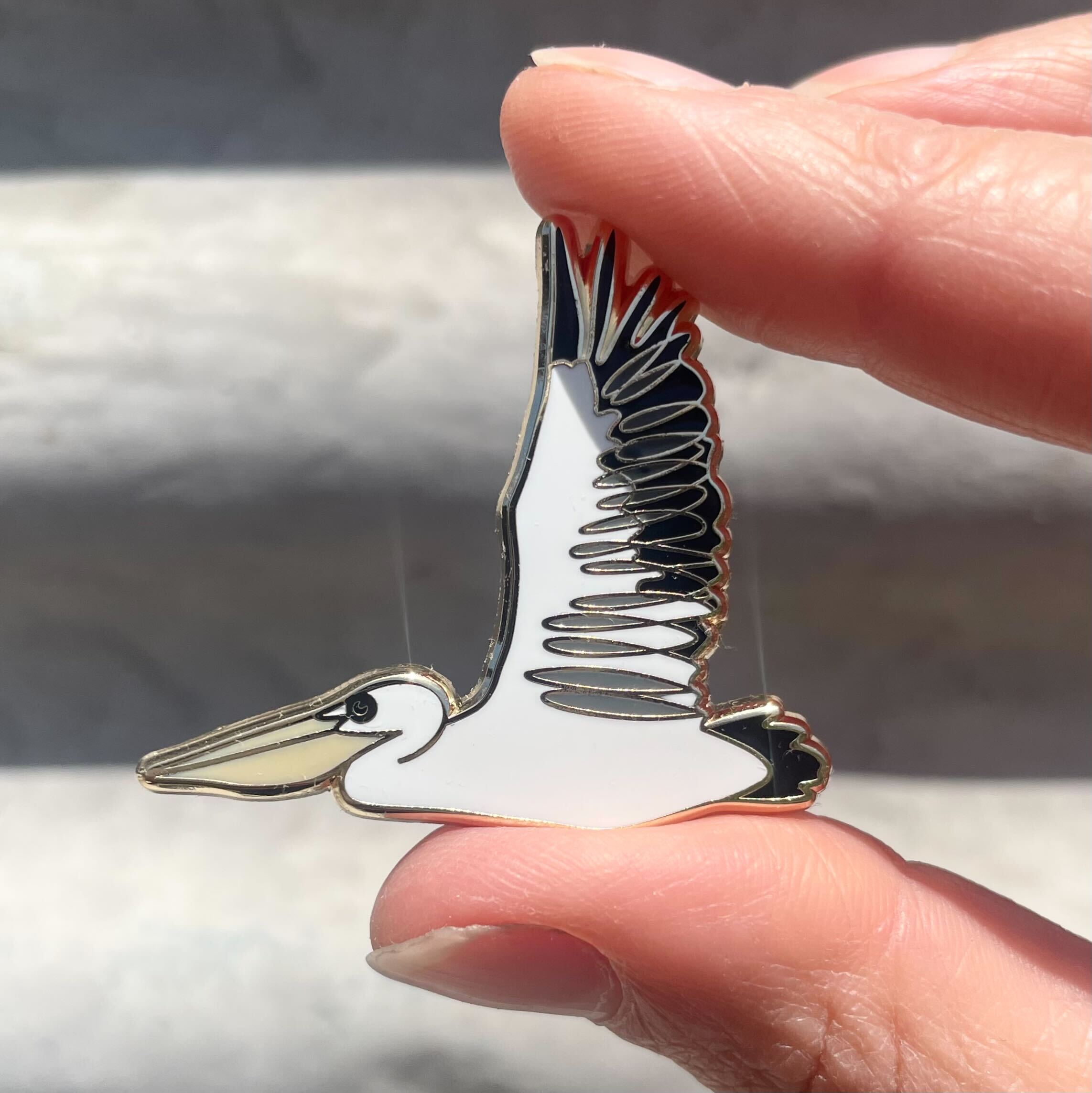 Pelican in Flight Enamel Pin