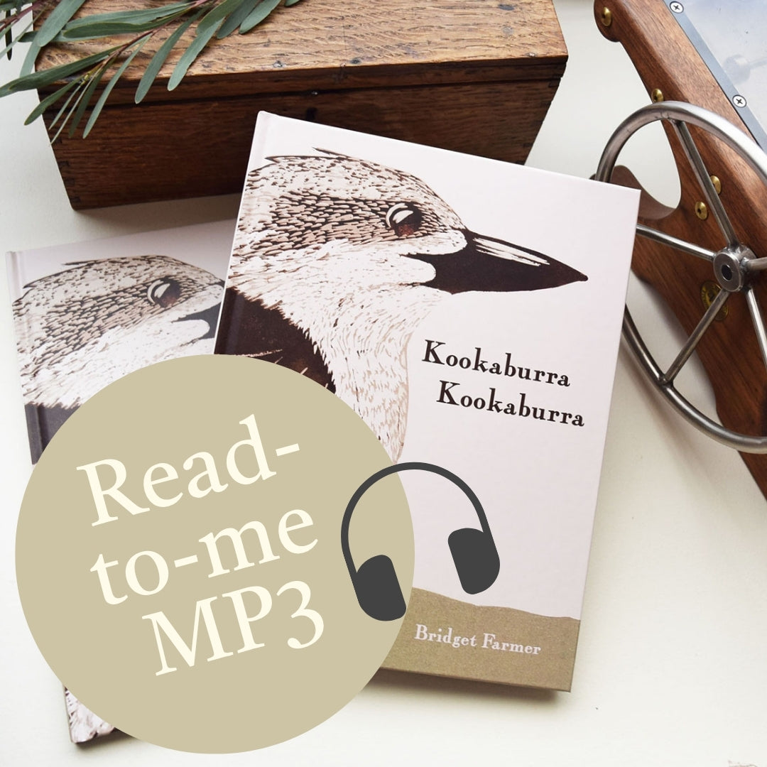 A book cover for 'Kookaburra' by Bridget Farmer is shown on a tabletop with a large beige circular badge reading 'Read-to-me MP3' and a headphone icon. The cover features a detailed bird illustration and is styled with a wooden box, greenery, and a metal wheel in the background.